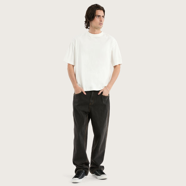 Model wears Gillette Heavy Crop Tee Natural White T-Shirts in Off-White - Image 3