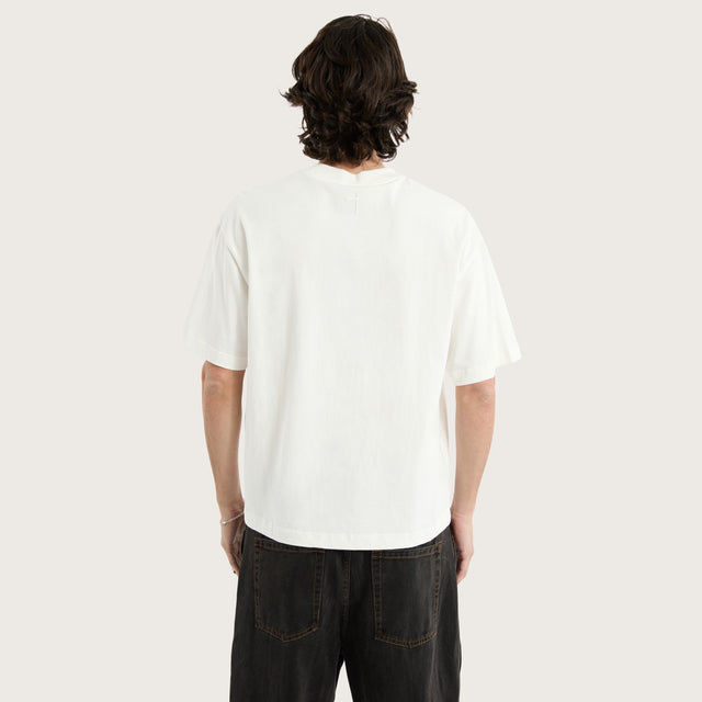 Model wears Gillette Heavy Crop Tee Natural White T-Shirts in Off-White - Image 4
