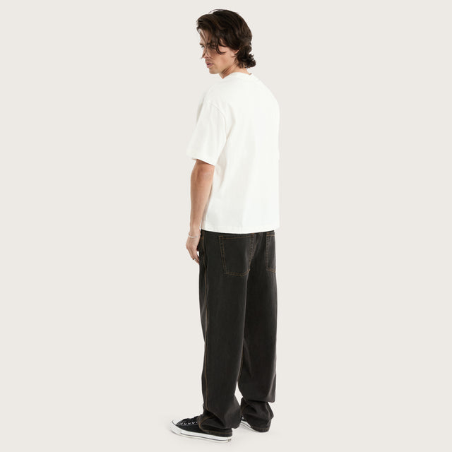 Model wears Gillette Heavy Crop Tee Natural White T-Shirts in Off-White - Image 5