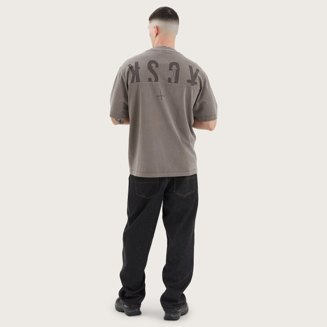 Model wears West Oversized Tee Pigment Iron T-Shirts in Brown - Image 5