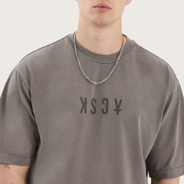Model wears West Oversized Tee Pigment Iron T-Shirts in Brown - Image 2