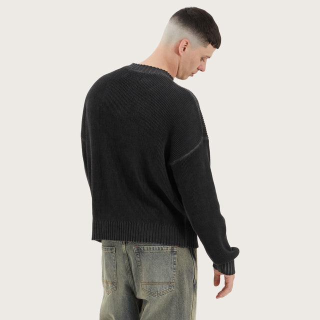 Model wears Pershore Knit Jumper Oil Wash Black Jumpers in Black - Image 4