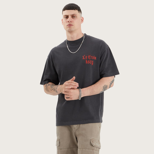 Model wears Tonle Street Tee Pigment Black T-Shirts in Black - Image 2