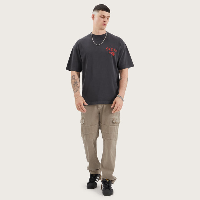 Model wears Tonle Street Tee Pigment Black T-Shirts in Black - Image 4