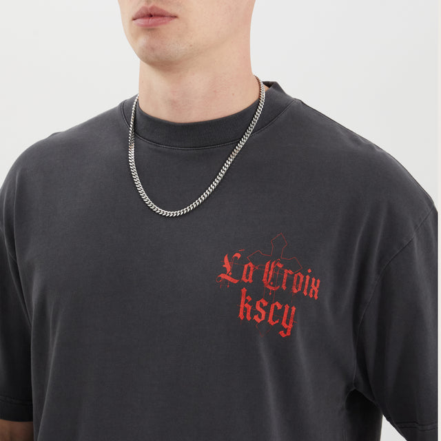 Model wears Tonle Street Tee Pigment Black T-Shirts in Black - Image 3