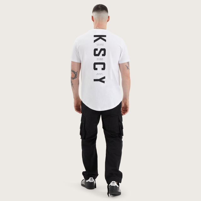 Model wears Ilment Dual Curved Tee Optical White T-Shirts in White - Image 5