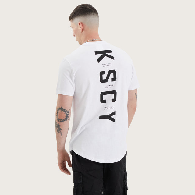 Model wears Ilment Dual Curved Tee Optical White T-Shirts in White - Image 1