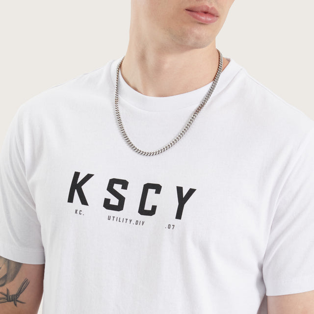 Model wears Ilment Dual Curved Tee Optical White T-Shirts in White - Image 3