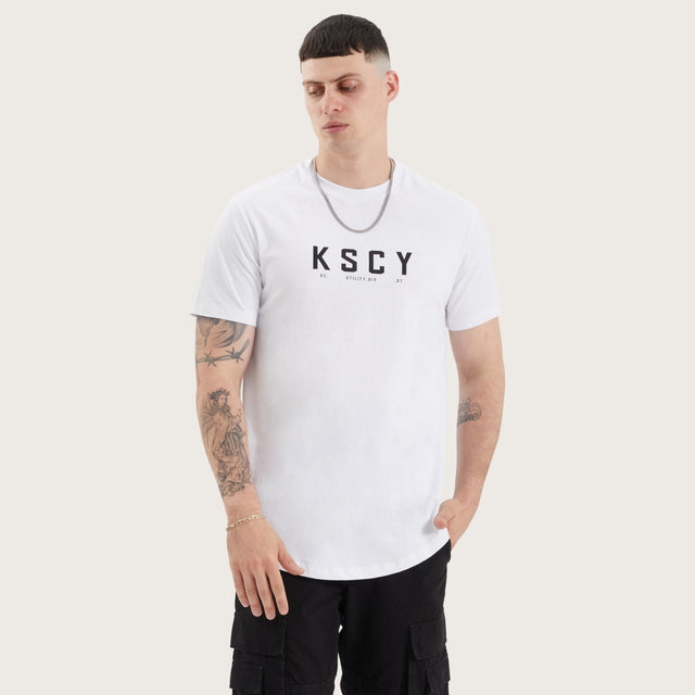 Model wears Ilment Dual Curved Tee Optical White T-Shirts in White - Image 2
