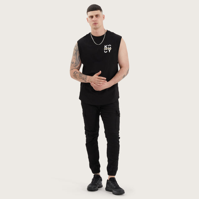 Model wears Tyrell Dual Curved Muscle Jet Black Muscle Tees in Black - Image 4