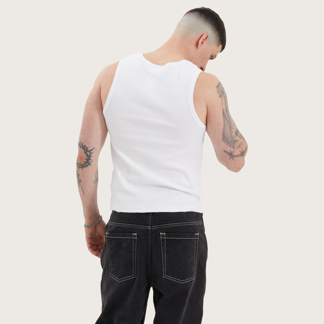 Model wears Baikal Relaxed Singlet Optical White Tanks in White - Image 2