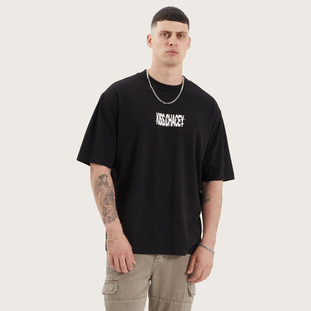 Model wears Wright Oversized Tee Jet Black T-Shirts in Black - Image 1