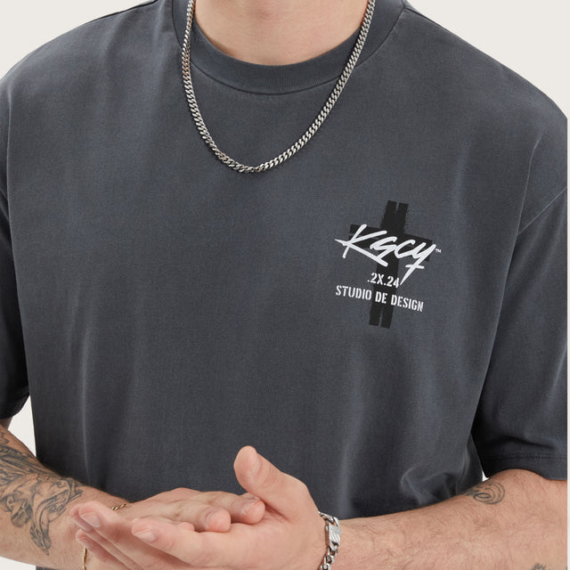Model wears Wendel Box Fit Tee Pigment Asphalt T-Shirts in Grey - Image 3