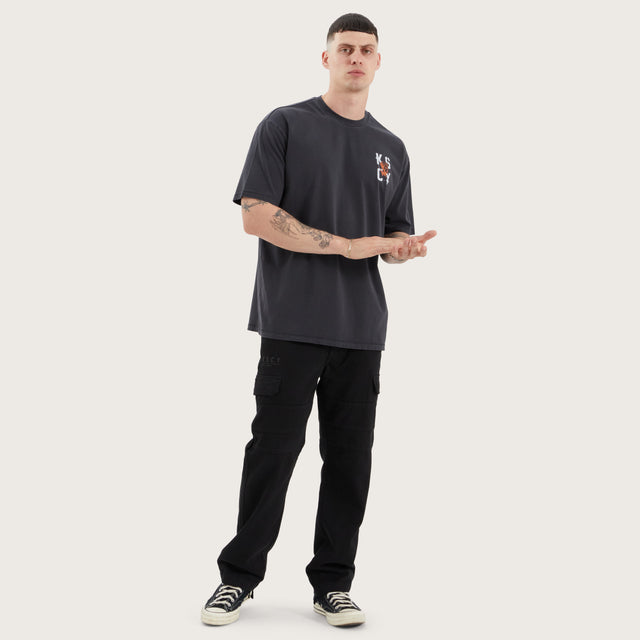 Model wears Untamed Box Fit Tee Pigment Black T-Shirts in Black - Image 5