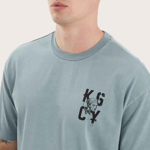 Model wears Untamed Box Fit Tee Pigment Lead T-Shirts in Green - Image 3