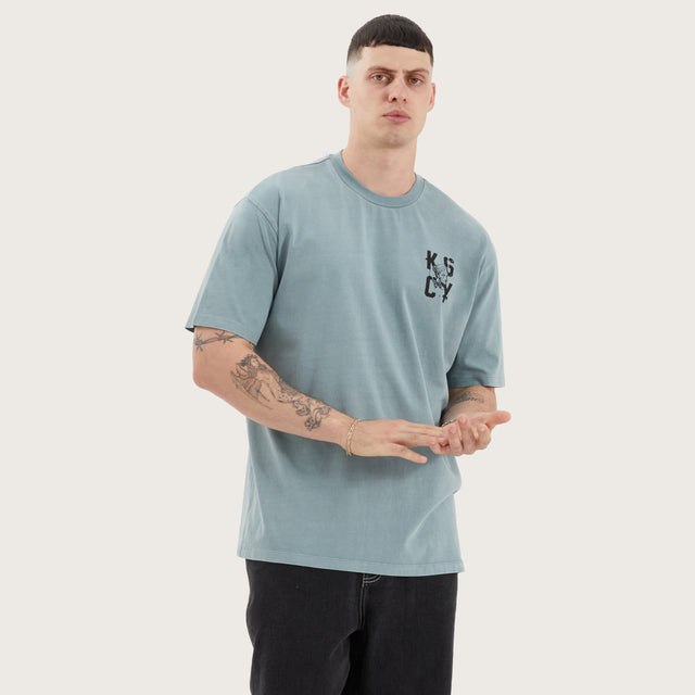 Model wears Untamed Box Fit Tee Pigment Lead T-Shirts in Green - Image 2