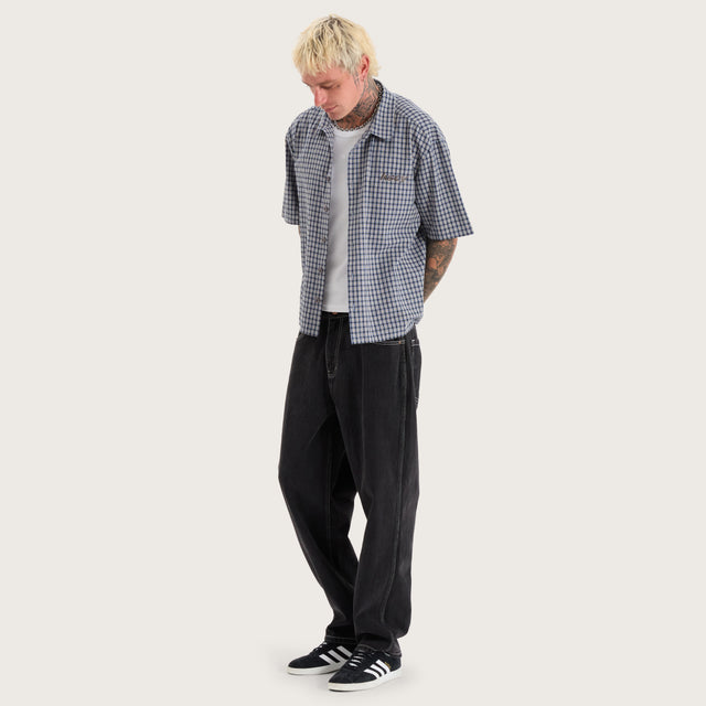 Model wears Skylar Oversized Dress Shirt Blue Check Short Sleeve Shirts in Blue - Image 5