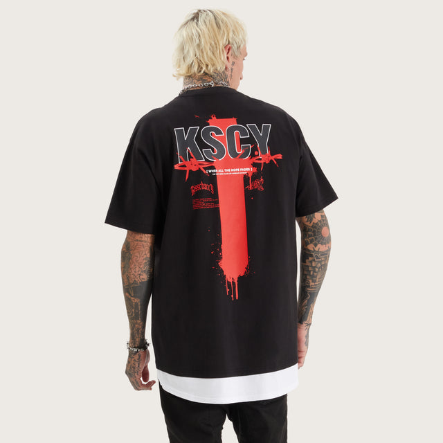 Model wears Unforward Box Fit Layer Tee Jet Black T-Shirts in Black - Image 2