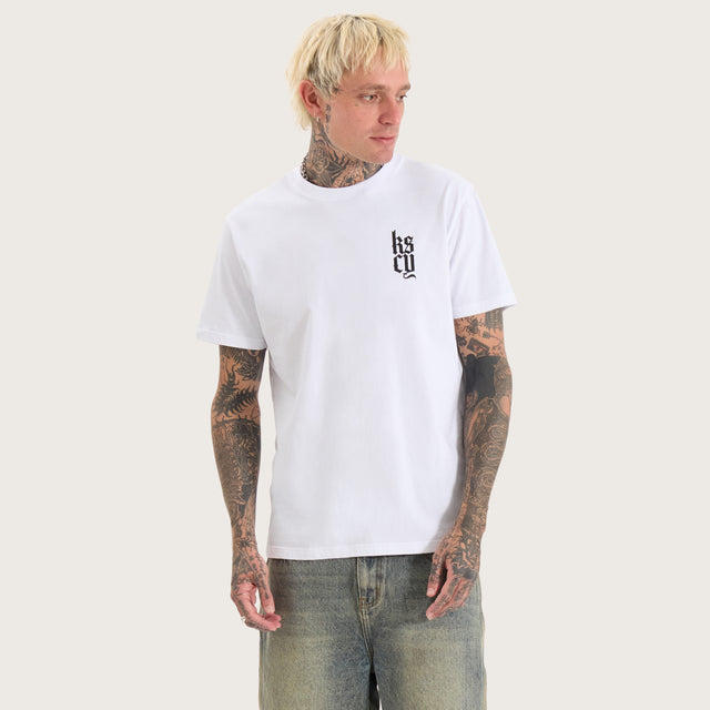 Model wears Defiant Standard Tee Optical White T-Shirts in White - Image 2