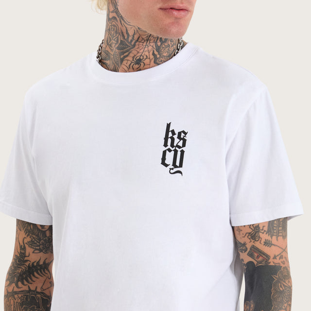 Model wears Defiant Standard Tee Optical White T-Shirts in White - Image 3