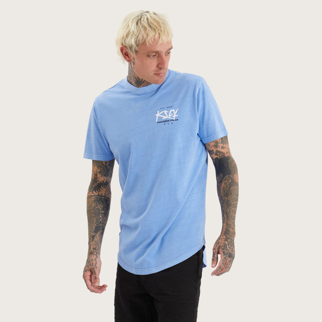 Model wears Luxor Dual Curved Tee Pigment Corn Flower T-Shirts in Blue - Image 1