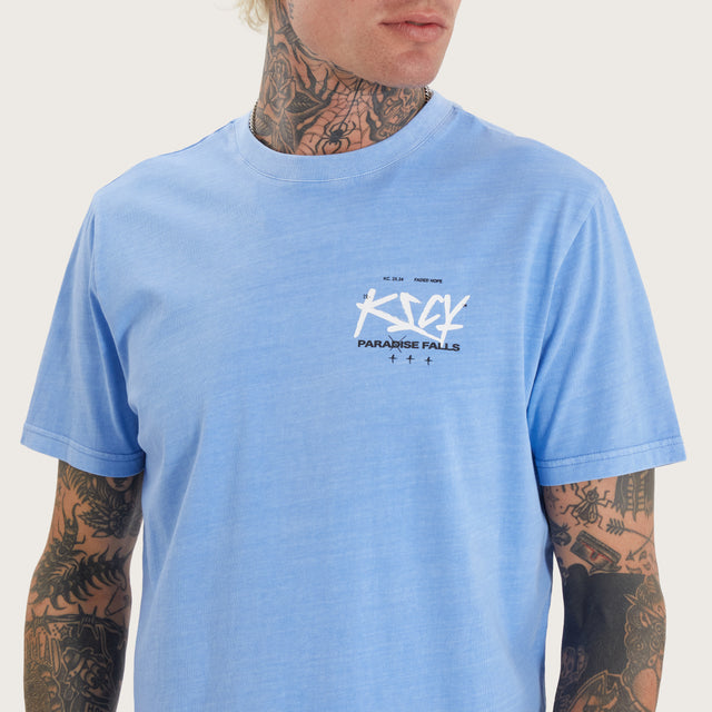 Model wears Luxor Dual Curved Tee Pigment Corn Flower T-Shirts in Blue - Image 3