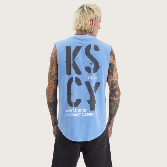 Model wears Harmon Dual Curved Muscle Pigment Corn Flower Muscle Tees in Blue - Image 2