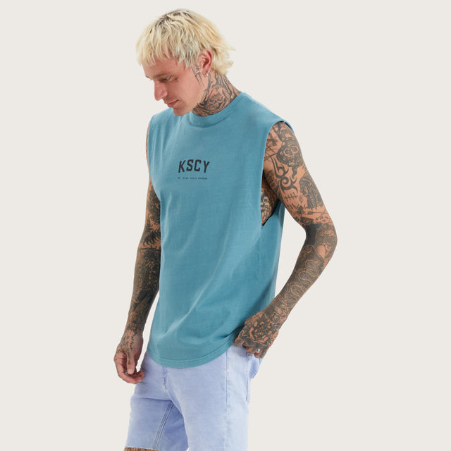 Model wears Nebo Dual Curved Muscle Pigment Brittany Blue Muscle Tees in Blue - Image 2