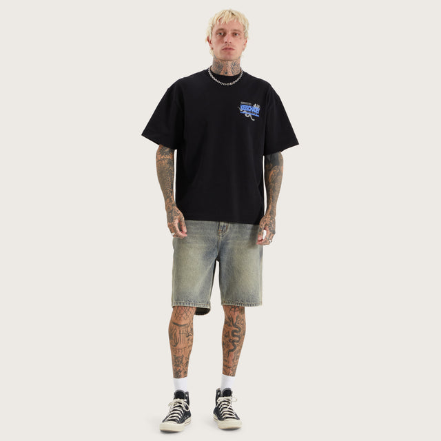 Model wears Mathry Street Tee Jet Black T-Shirts in Black - Image 5