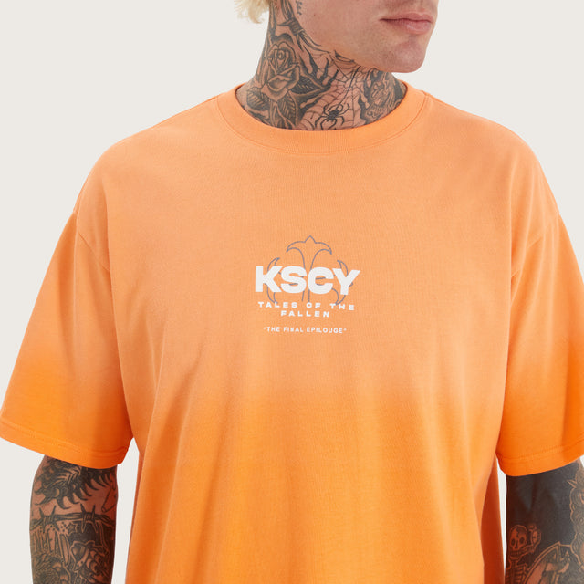 Model wears Cuffern Box Fit Tee Nectarine T-Shirts in Orange - Image 3