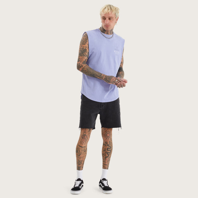 Model wears Principate Dual Curved Muscle Pigment Thistle Down Muscle Tees in Purple - Image 4