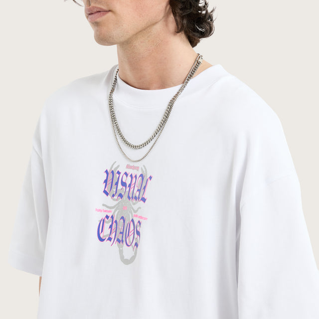 Model wears Scorpio Street Tee Optical White T-Shirts in White - Image 4