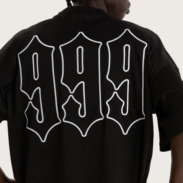 Model wears Teamwork Mesh Jersey Jet Black Jerseys in Black - Image 3