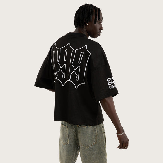 Model wears Teamwork Mesh Jersey Jet Black Jerseys in Black - Image 4