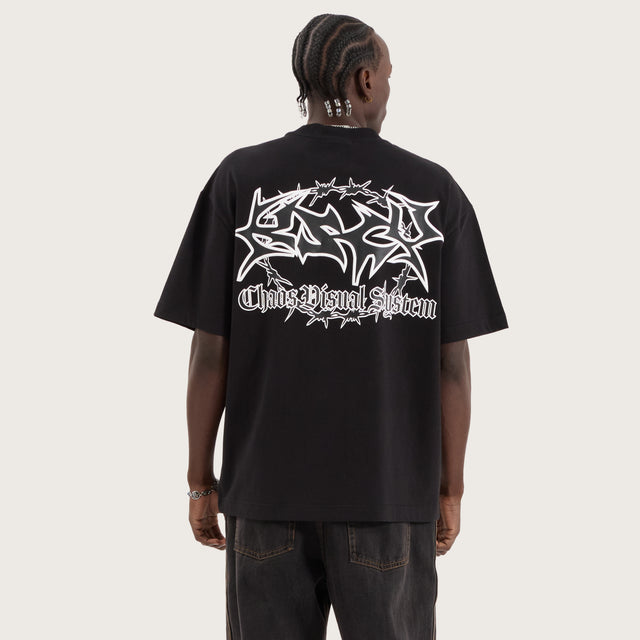 Model wears Wire Street Tee Jet Black T-Shirts in Black - Image 1