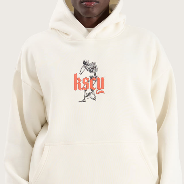 Model wears Intertwined Oversized Hoodie Tofu Hoodies in Beige - Image 2