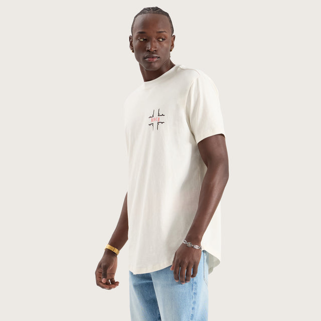Model wears Thready Dual Curved Tee Natural White T-Shirts in White - Image 3