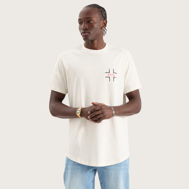 Model wears Thready Dual Curved Tee Natural White T-Shirts in White - Image 5