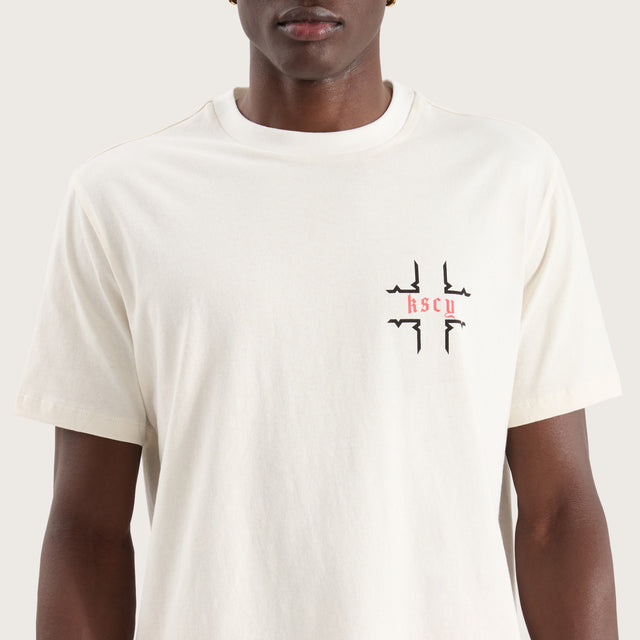 Model wears Thready Dual Curved Tee Natural White T-Shirts in White - Image 2