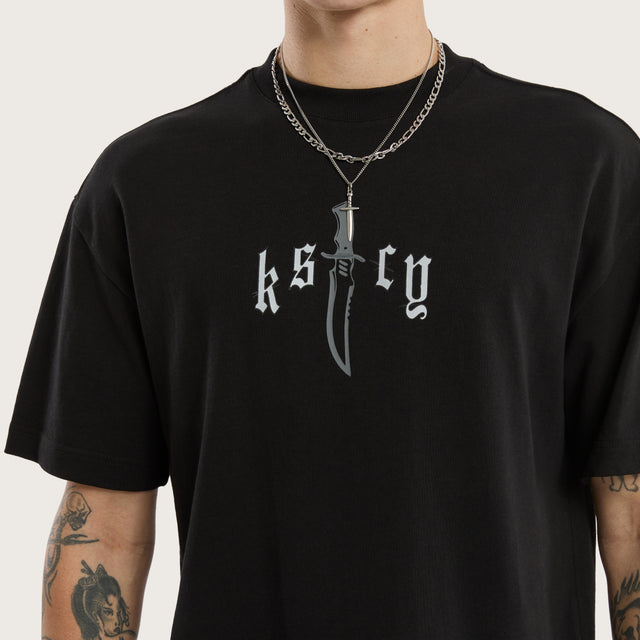 Model wears Rambo Street Tee Jet Black T-Shirts in Black - Image 5