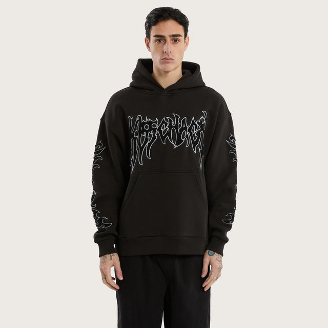 Model wears Scyth Relaxed Hoodie Jet Black Hoodies in Black - Image 2