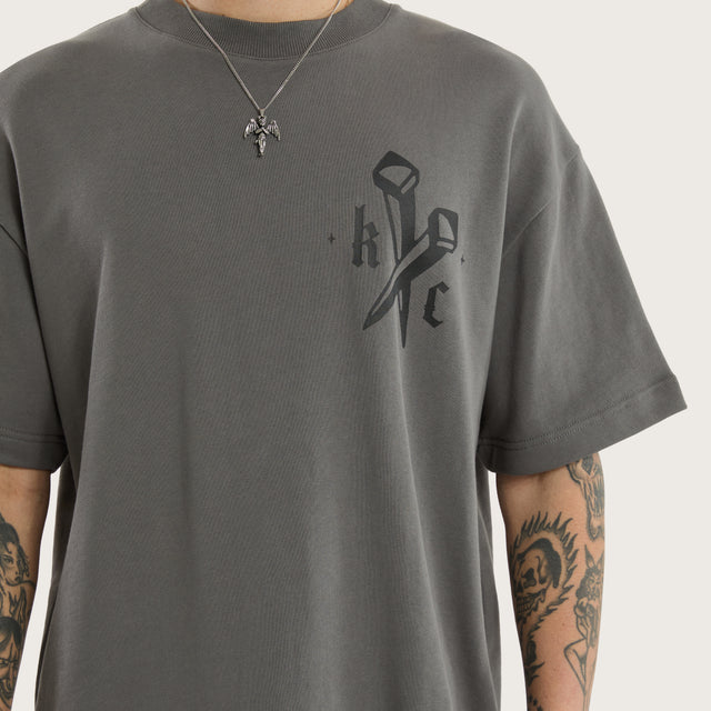 Model wears Nailed Loopback Street Tee Charcoal Grey T-Shirts in Grey - Image 3