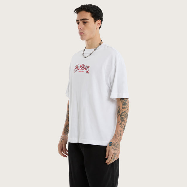 Model wears Archer Heavyweight Box Fit Tee Optical White T-Shirts in White - Image 4