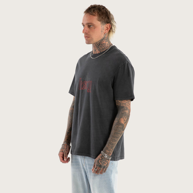 Model wears Within Relaxed Fit Tee in Black T-Shirts in Black - Image 3