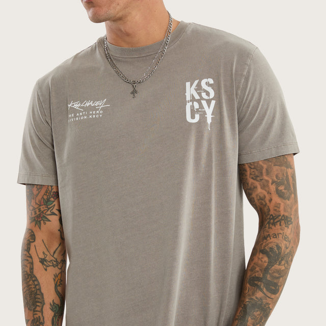 Model wears Alpha Curved Hem Tee Pigment Elephant Grey T-Shirts in Grey - Image 5
