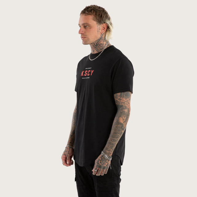 Model wears Stamp Curved Hem Tee Jet Black T-Shirts in Black - Image 4