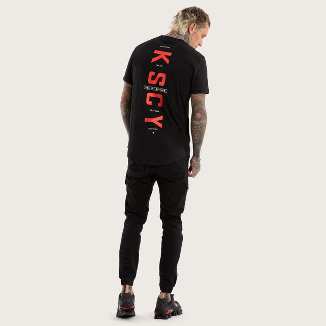 Model wears Stamp Curved Hem Tee Jet Black T-Shirts in Black - Image 5