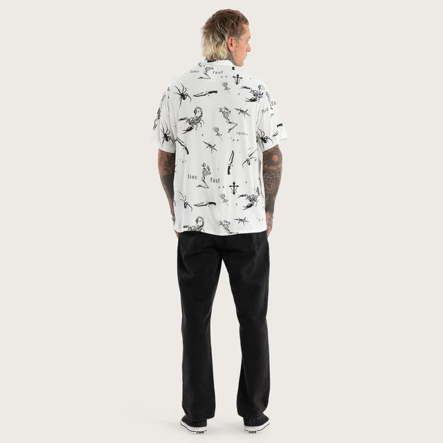 Model wears Scatter Resort Short Sleeve Shirt White Print Short Sleeve Shirts in White - Image 2