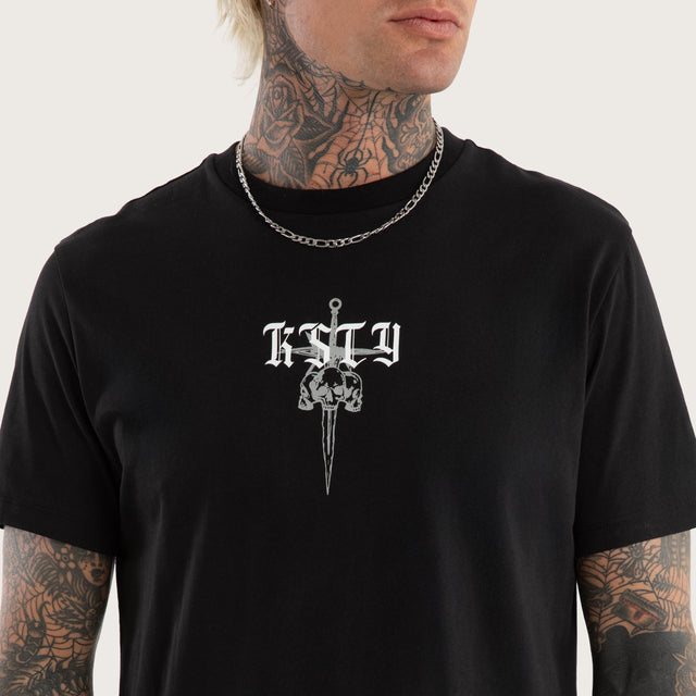 Model wears Testament Dual Curved Tee Jet Black T-Shirts in Black - Image 7