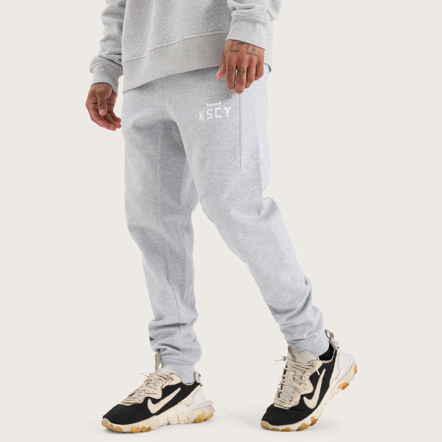 Model wears Flex Track Pant Grey Marle Pants in Grey - Image 6